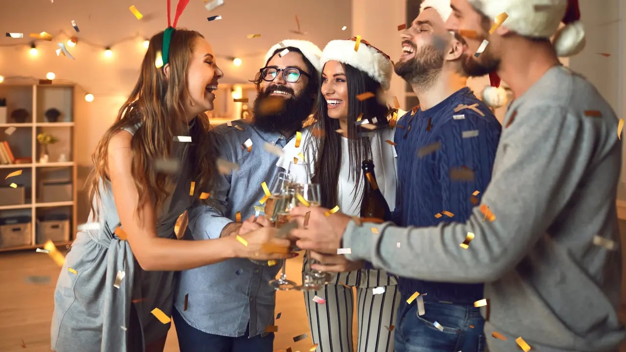 a group of friends wearing casual cloths for the Christmas Party