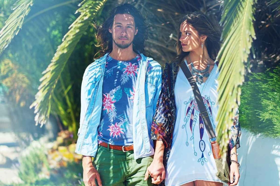 a man and woman attending coachella