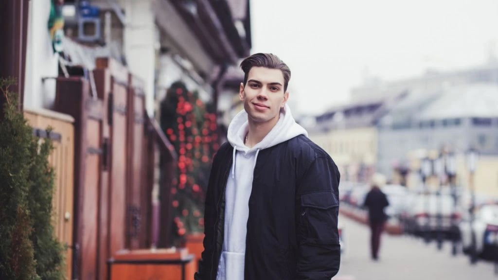 a men wearing a bomber jacket