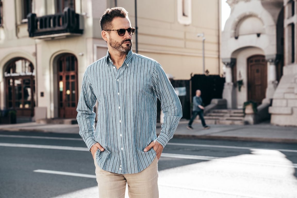 a man walking in the street in Spring clothes