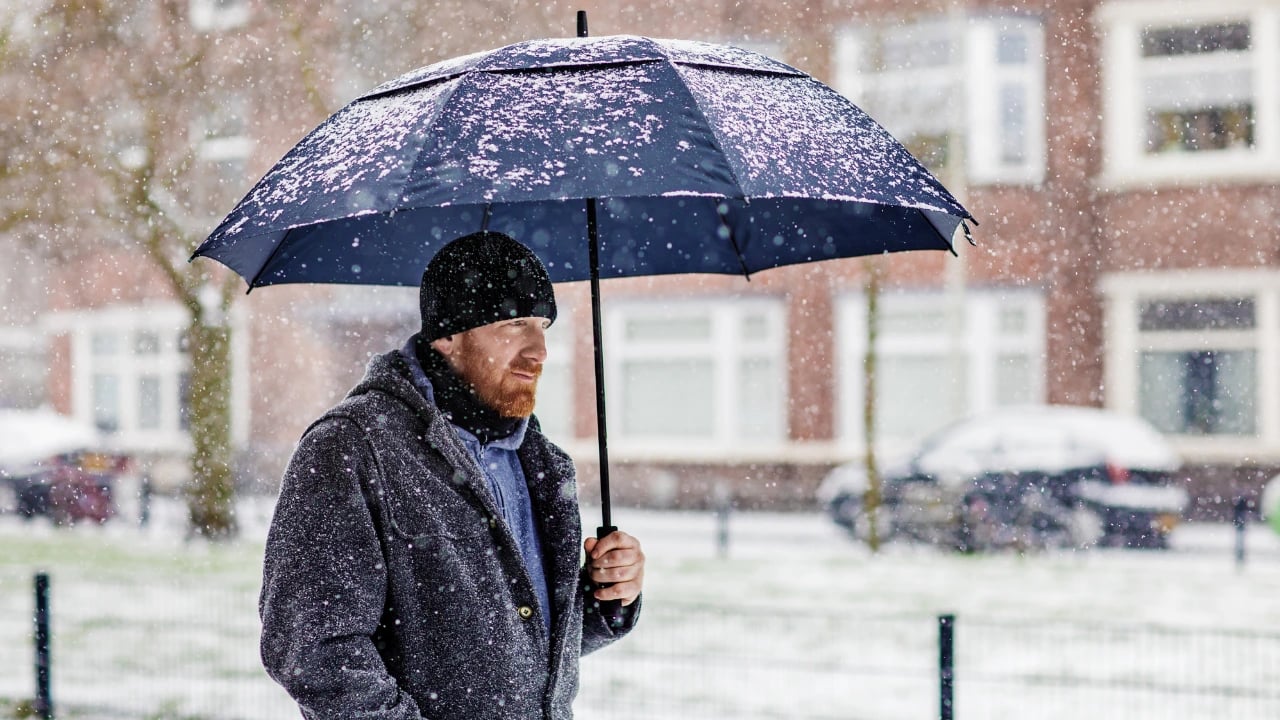 a man walking in the snow